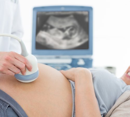 pregnant-woman-undergoing-ultrasound pregnant-woman-undergoing-ultrasound
